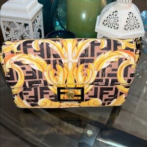 Elegant Yellow and Black Patterned Clutch